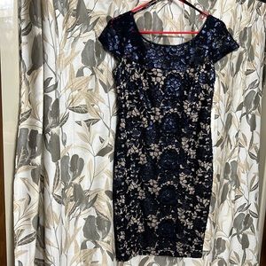 Fully lined Calvin Klein dress.